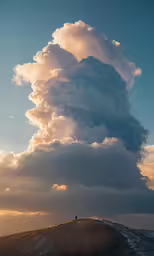 clouds above the hillside in a clear day