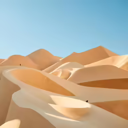 some large sand dunes that look like they have ridges