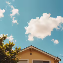 the roof of a house that has a window on it