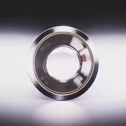 the bearing wheel on a silver wheel on a white surface