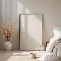 there is a bed and a vase on the floor