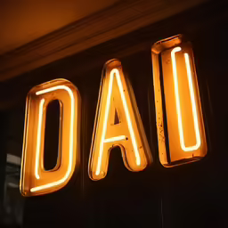 a neon sign that says dad on it