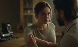 a man and a woman standing next to each other