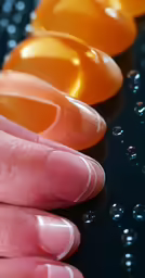 several different shades of orange are sitting on the surface