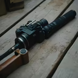 a camera on top of a wooden surface