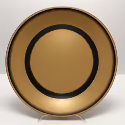 an elegant plate is shown on a pedestal