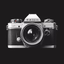 the front of a digital camera with an adapt and lens cap on it