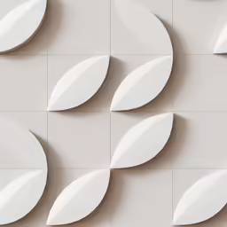 the white tiles have leaf shapes on it