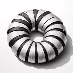 an abstract object with rings on it and black and white stripes