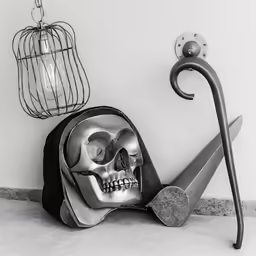 a bag sitting on top of a floor next to scissors and a birdcage