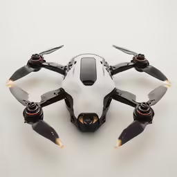 a white propeller flying over a white surface