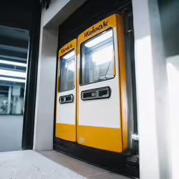 this train is sitting in the train station