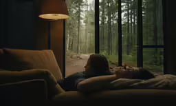 a couple of people that are laying down