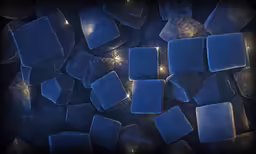 a dark and sparkling background of blue chunks