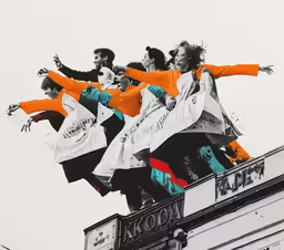 a large group of people on top of a building