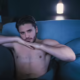 man in the middle of the night, with his shirt on