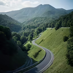 winding road in the mountains on a sunny day