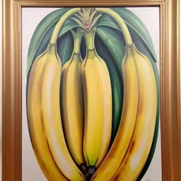 painting of bananas hangs on a wall
