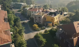 looking down on a row of houses along a road in the foreground