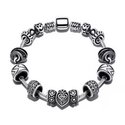 a bead bracelet with two hearts and hearts on it,silver bracelet with charms and hearts