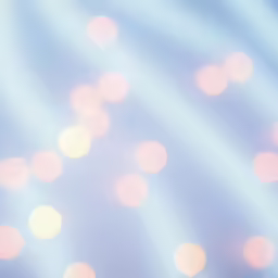 an orange and white cake with sprinkles on it