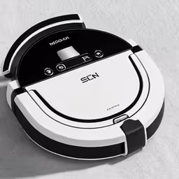 the vacuum is charging on a surface that looks like snow