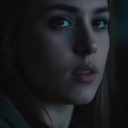 an image of a woman in the dark