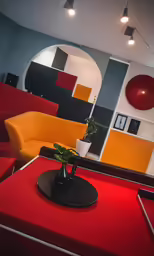 a photo taken in an office with an interesting mirror