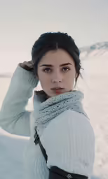 the woman is in winter clothes with her hair up