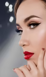 an image of a woman with bright red lips