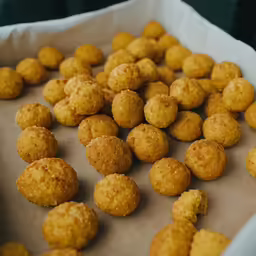 close up of a bunch of food being prepared in a container