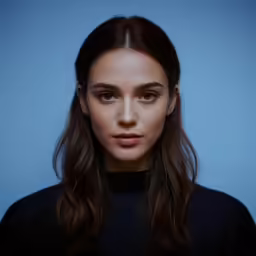 an image of the model posing with long hair