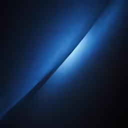 the sun is reflected in the black surface of the space