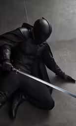 a man in full gear holds a sword