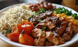 a plate of asian food sits on a table