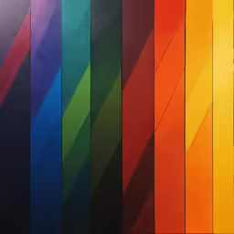 a close up of many different colored paper