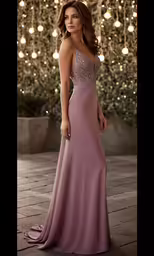 a woman standing on top of a floor in a long dress