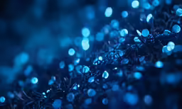 light bubbles in blue color and blurry background