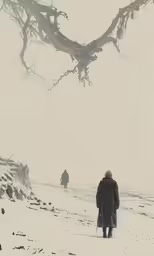 a person walking in the snow near an enormous tree