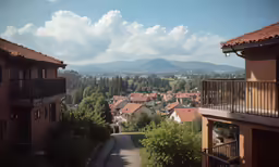 a small town with several red roofed buildings