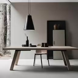 an elegant dining table sits in front of a mirror and a large vase