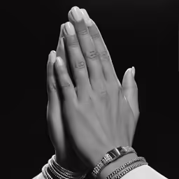 a pair of hands that are placed up together
