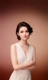 a woman in a white dress is posing for a picture