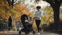 a woman pushing a stroller and child in a stroller