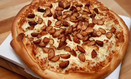 a pizza that is sitting on top of a white paper