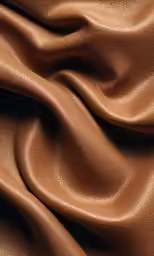 a dark brown fabric with wavy lines