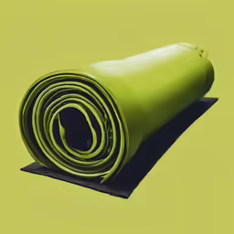 green yoga mat on a yellow background