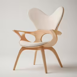 the chair has a shell shaped shell on top and wooden frame