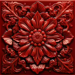 an ornate red painting on a red wall