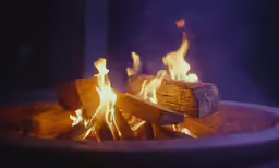a close up of fire burning in a bowl